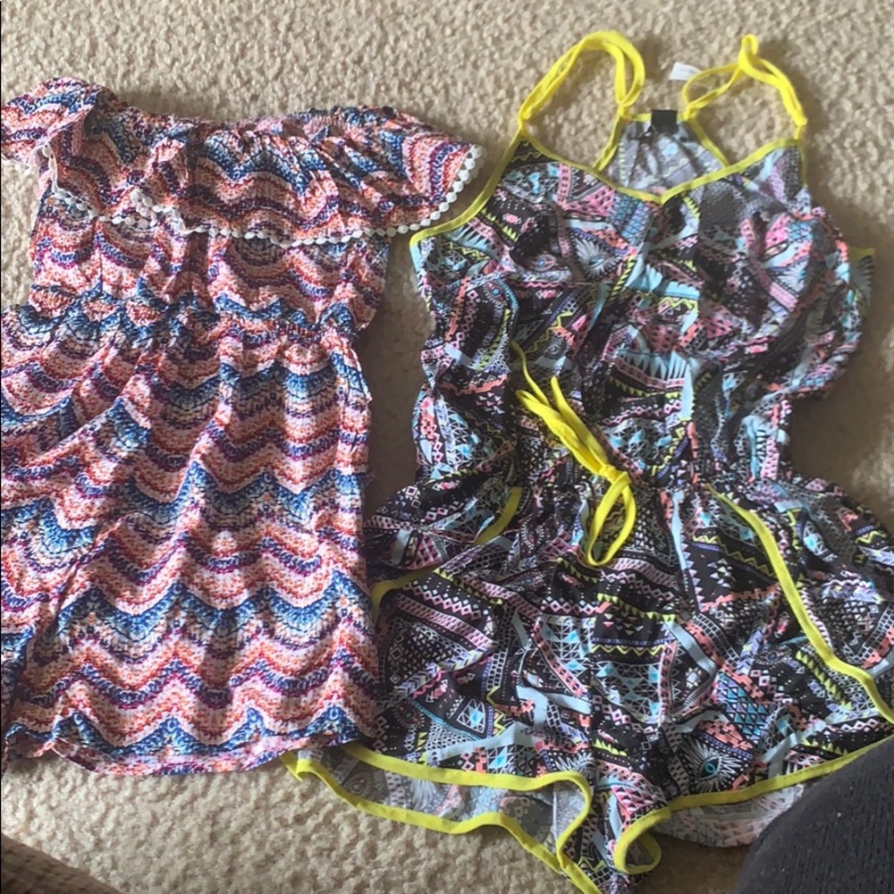 2 multicolored romper size small. Never worn